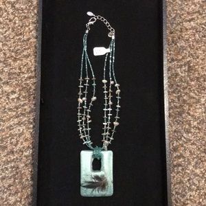 Turquoise-colored beaded necklace